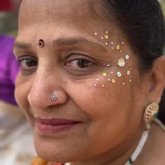 What I mean when I say my art is for every age group. This lovely aunty was so happy with her beautiful rhinestone design.