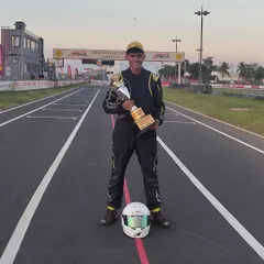 This is the moment we work for. A driver celebrating a hard earned victory in the National Karting Championship. It’s a testament to the grit, resilience, and relentless effort put in by the entire team.