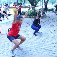 Working on squat form and shoulder stability using bamboo sticks. I focus on using simple tools to teach fundamental movement patterns correctly.