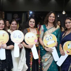 An emoji-themed game at a ladies' party. These props add a fun visual element to the games and make for great photos.