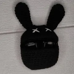 The bunny AirPods case in action, keeping your earbuds safe and sound inside its crocheted belly.