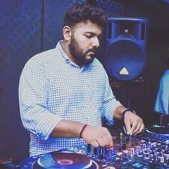 Focused on the mix. I take pride in my craft, ensuring every detail is perfect to deliver a high-quality audio experience for your guests.