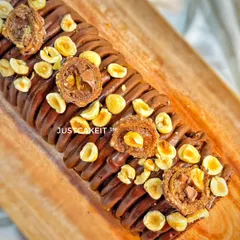 This decadent Ferrero Swiss Roll is a chocolate and hazelnut lover's dream. Made with premium couverture chocolate, it's rich, travel-friendly, and packed with Ferrero Rocher flavor.