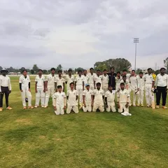 The RSCA U-16 boys' team poses for a photo on the field, representing the next generation of senior cricketers.