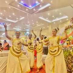 We arrange for captivating entertainment, like this traditional Mohiniyattam dance troupe, to add a touch of cultural elegance and live performance art to your social event.