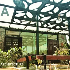 This pergola at our Cloverfield project features a custom-designed, laser-cut roof. The pattern creates playful shadows on the ground below, offering a semi-shaded outdoor space that is both functional and artistic.