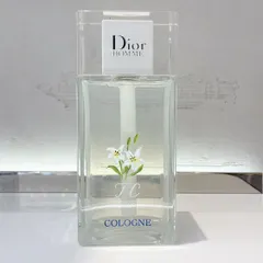 "White is pure and simple and matched with everything." Inspired by Christian Dior's words, I painted these dainty white lilies and added engraved initials to a Dior Homme Cologne bottle onsite.