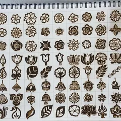 I love exploring different floral shapes in my sketchbook. From simple blossoms to complex roses and lotuses, these elements bring life to my henna designs.