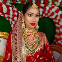 A close-up of a traditional Bengali bridal look. I focused on creating dramatic, well-defined eyes and used a classic red lip, which are key elements of this style.
