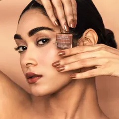 For this nail lacquer shoot, the goal was perfect, clean execution. I focused on precise lighting to highlight the glossy texture of the polish and the product bottle's details, while keeping the model's skin looking natural and radiant. This is the kind of crisp, commercial work I deliver for beauty brands.