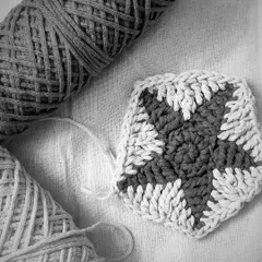 A simple two-toned granny square. Crocheting has taught me the beauty of learning and unlearning. Every stitch is a lesson in patience and growth, and there's beauty in these simple moments.