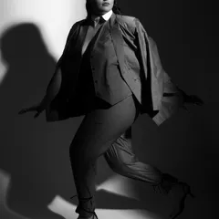 A dynamic shot from the Social Ketchup editorial with Sakshi Sindwani. The movement in this photo showcases how a well-styled power suit can be both commanding and fluid.