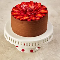 Our Chocolate & Strawberry Cake, topped with a beautiful flower made from fresh Mahabaleshwar strawberries. We wait for our trusted vendor to give us the green light on the season's best fruit before it makes its way to our menu.