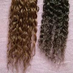 For my clients with curly hair, I have the perfect match. These two wefts show the beautiful, natural curl pattern of my 100% human hair extensions in different shades.