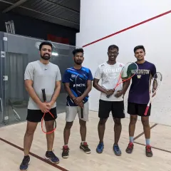 A group of adult players ready for their squash session. We provide programs for adults to start or restart their squash journey in a friendly, motivating environment.