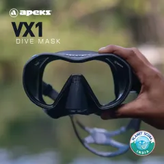 The Apeks VX1 mask, held to showcase its premium, surgical-grade silicone skirt and frameless design. Produced in Italy, this mask is a testament to quality craftsmanship and superior diving comfort.