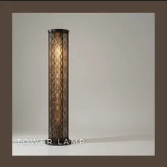 Tower lamps offer a modern and elegant way to provide soft, diffused light. Their vertical form makes a sculptural statement while creating a warm and inviting atmosphere, ideal for living rooms or hallways.