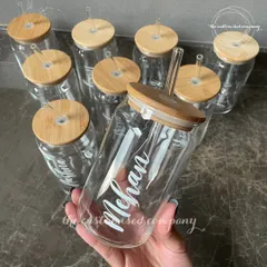 These clear glass sippers with bamboo lids are a stylish and eco-friendly choice. Each one is personalized with a name in elegant script, making hydration a little more special.