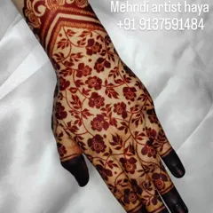 A perfect example of a beautifully developed henna stain. The floral net pattern is crisp and clear, and the color is a rich, dark reddish-brown.
