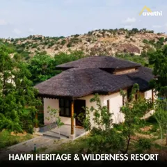 The Hampi Heritage & Wilderness Resort offers cottages nestled among the region's iconic rocky terrain. It's a perfect example of a stay that allows you to feel connected to Hampi's unique natural landscape.
