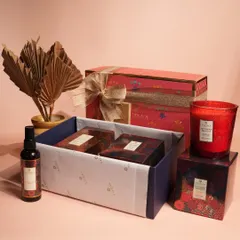 This vibrant red-themed gift set is perfect for festive occasions or a romantic gesture. It features a room spray, a glass candle, and other fragrance products, all beautifully packed and ready to delight.