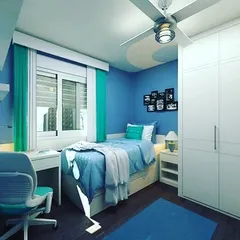 A fully painted bedroom with a cohesive blue and white color scheme. I can help you choose and apply colors that create a relaxing and unified atmosphere.