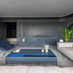 A perspective of the living room showing the curved perforated partition that provides a seamless HVAC solution.