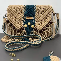 This beautiful sling bag was a complete custom order. The customer chose the colors, bead style, and even a personalized keychain to go with it.
