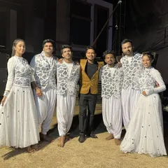 Our professional dance troupe in elegant white and silver costumes, ready backstage for a sangeet performance. We provide dancers with a variety of themed costumes to match your event's aesthetic.