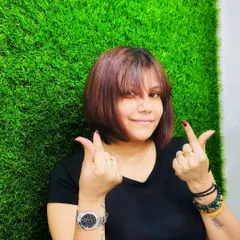 A new haircut can be the best accessory. This fresh bob with soft bangs is a great way to reset your style for the summer, adding a sharp and energetic touch to any look.