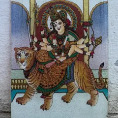 Here, the divine warrior Goddess Maa Durga is depicted riding her tiger, a symbol of immense strength and protection. I use vibrant gemstones to detail her form and weapons, creating an artwork that fills your home with courage and positive energy.