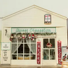 Our storefront all dressed up for Christmas. With stockings, wreaths, and "Merry Christmas" banners, it's a warm and festive welcome for all our guests.