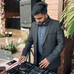 Dressed for a formal event. I can tailor my presence and music for more formal occasions like receptions or upscale private parties, ensuring a classy yet fun atmosphere.