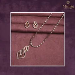 Delicate charm and minimalist shine. This leaf-inspired diamond pendant and earring set is perfect for those who love subtle sophistication in their daily jewellery.