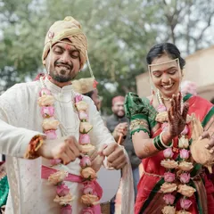 Pure happiness and excitement as the Maharashtrian wedding rituals unfold. We focus on capturing the couple's genuine reactions and the festive energy of their special day.