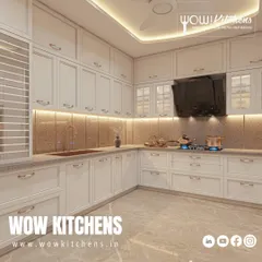 A closer view of the classic white kitchen, showing the beautiful copper-toned sink and faucet that add a warm metallic accent against the neutral backdrop.