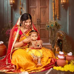 A playful moment as Maiyya feeds her little Kanha some butter. Our detailed sets include traditional props like matkas to bring the story to life.