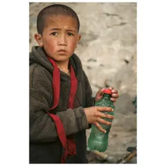 A poignant portrait of a young monk in Ladakh, his innocent eyes and sun-kissed cheeks telling a story of life in the high Himalayas.