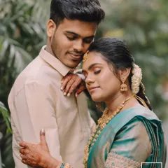 An intimate and tender portrait of a couple in a close embrace, their eyes closed in a moment of peaceful connection.