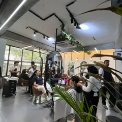 A busy day at the salon. I love the energy when my team is working together, helping clients achieve their desired looks in our modern and open space.