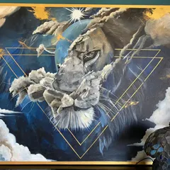 A close-up of the lion painting, showing the detail in the eye and the texture of the clouds. This piece was a wedding gift, designed to honor the couple's personalities and match the color scheme of their home.