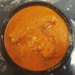 This is our authentic Multani-style Butter Chicken, made with our mother's recipe. The gravy is rich, flavourful, and has the true taste of home.