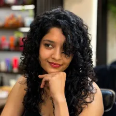 It was a joy to give the talented actress Ritika Singh a curly makeover. I focused on creating a shape that frames her face beautifully while ensuring her curls are defined and full of life.