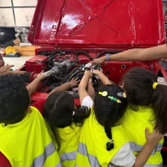 Learning isn't confined to a classroom. On our Adventure Days, we take learning into the real world. Here, our Kindergarteners get a hands-on look under the hood of a car, sparking countless questions about how things work. These experiences make learning tangible, memorable, and incredibly exciting.