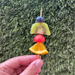 Another look at our colorful and healthy fruit skewers, perfect for a sunny day treat or as a light addition to any event.