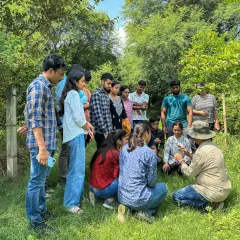 The best questions come when you get down to nature's level. I was showing these students from Amity University something interesting I found in the soil. These moments of discovery are what our educational walks are all about.