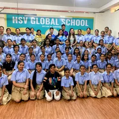 A group photo with the bright young women of HSV Global School. My mission is to equip the next generation with the confidence and skills they need to feel safe and secure.