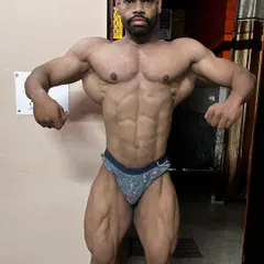 The front lat spread is a power pose that showcases your V-taper and chest thickness. Proper execution is key to looking as wide as possible on stage, and it's a fundamental part of my posing coaching.