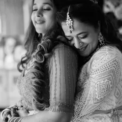A heartfelt hug between a bride and her mother. These are the quiet, emotional moments that often become the most cherished photographs from the day.