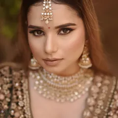 This outdoor shot showcases how the makeup translates in natural light. Our curriculum emphasizes creating versatile looks that are beautiful in any setting.